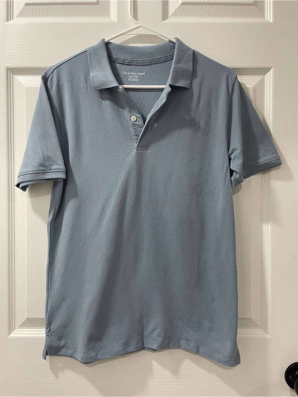 Calvin Klein Light Blue Polo Shirt with Subtle Logo